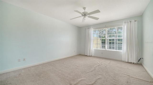 5566 Avellino Pl, Sarasota, FL 34238 - carpeted spare room featuring baseboards and ceiling fan