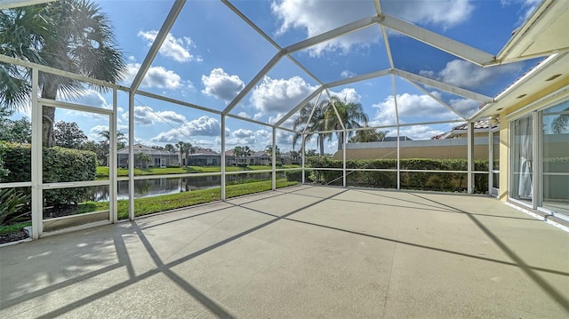 5566 Avellino Pl, Sarasota, FL 34238 - view of patio / terrace featuring a water view and glass enclosure