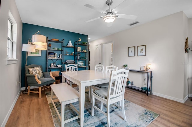 951 Varet Rd, Venice, FL 34293 - dining area with light wood-style floors, baseboards, and a ceiling fan
