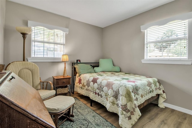951 Varet Rd, Venice, FL 34293 - bedroom with wood finished floors and baseboards