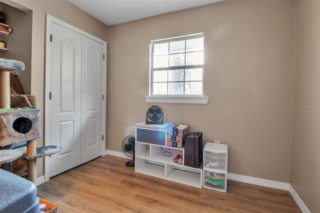 951 Varet Rd, Venice, FL 34293 - misc room featuring baseboards and wood finished floors