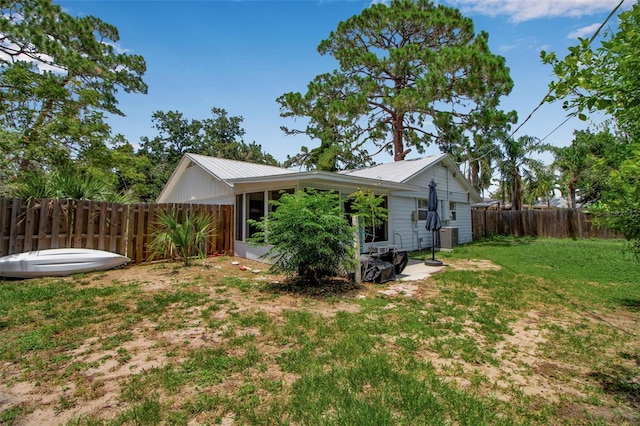 951 Varet Rd, Venice, FL 34293 - view of yard featuring a sunroom