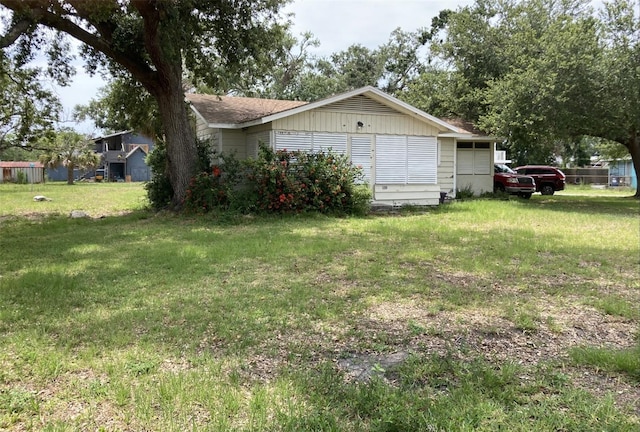 104 22nd Street Ct E, Bradenton, FL 34208 - view of home's exterior featuring a yard