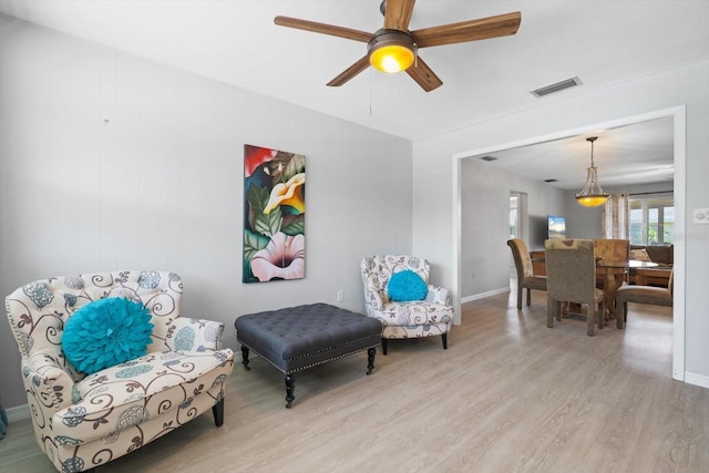 2503 Beneva Rd Unit 7, Sarasota, FL 34232 - sitting room featuring wood finished floors, ceiling fan, and baseboards
