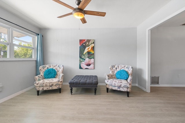 2503 Beneva Rd Unit 7, Sarasota, FL 34232 - sitting room with wood finished floors, ceiling fan, and baseboards