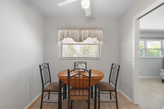 2503 Beneva Rd Unit 7, Sarasota, FL 34232 - dining area featuring light wood-style floors, ceiling fan, and baseboards