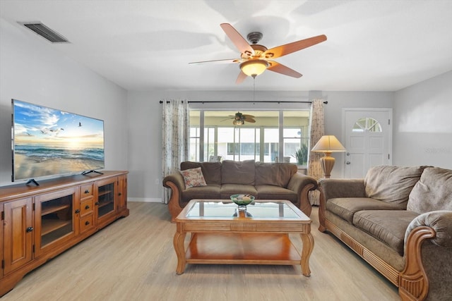 2503 Beneva Rd Unit 7, Sarasota, FL 34232 - living room featuring light wood-style floors, a ceiling fan, and baseboards