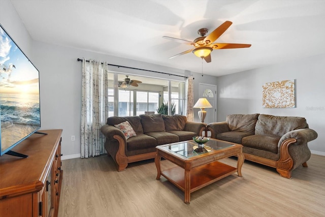 2503 Beneva Rd Unit 7, Sarasota, FL 34232 - living area featuring ceiling fan, light wood-style floors, and baseboards