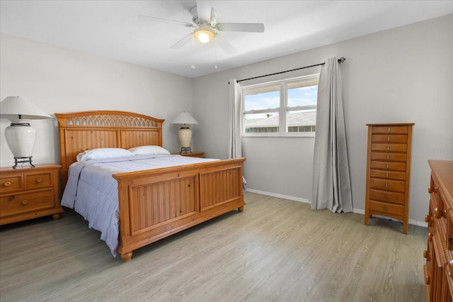 2503 Beneva Rd Unit 7, Sarasota, FL 34232 - bedroom featuring light wood-style floors, baseboards, and a ceiling fan