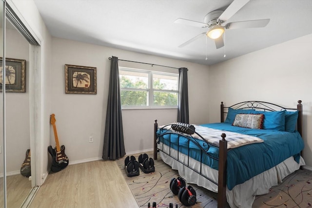2503 Beneva Rd Unit 7, Sarasota, FL 34232 - bedroom with wood finished floors, baseboards, and a ceiling fan