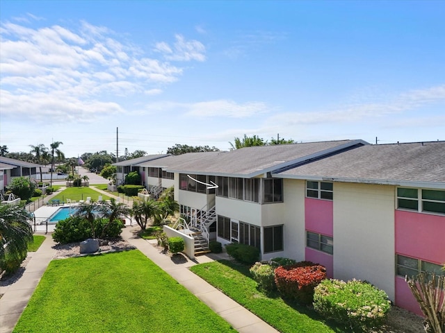 2503 Beneva Rd Unit 7, Sarasota, FL 34232 - view of community with a yard and stairs