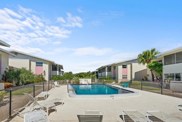 2503 Beneva Rd Unit 7, Sarasota, FL 34232 - community pool featuring a patio