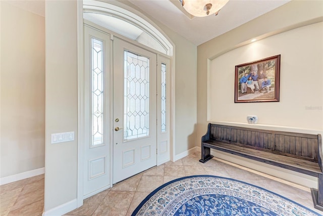 5205 88th St E, Bradenton, FL 34211 - foyer entrance featuring baseboards and light tile patterned floors