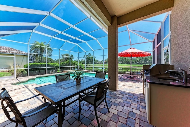5205 88th St E, Bradenton, FL 34211 - view of patio featuring an outdoor pool, a lanai, a sink, and outdoor dining space