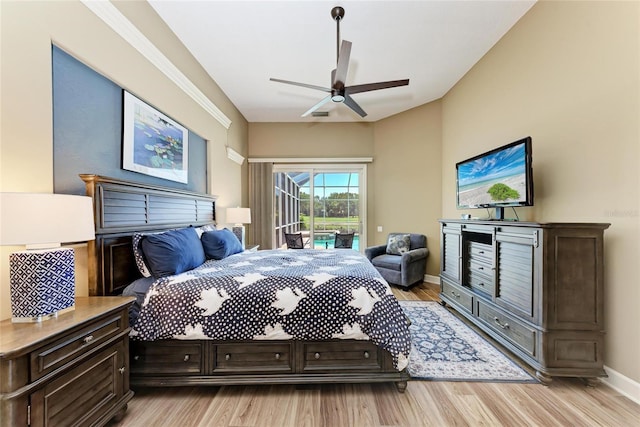 5205 88th St E, Bradenton, FL 34211 - bedroom with access to outside, light wood-type flooring, baseboards, and a ceiling fan