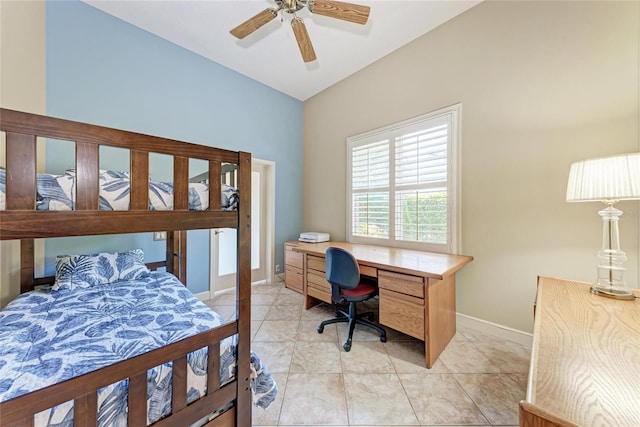 5205 88th St E, Bradenton, FL 34211 - bedroom featuring an office area, baseboards, light tile patterned floors, and a ceiling fan
