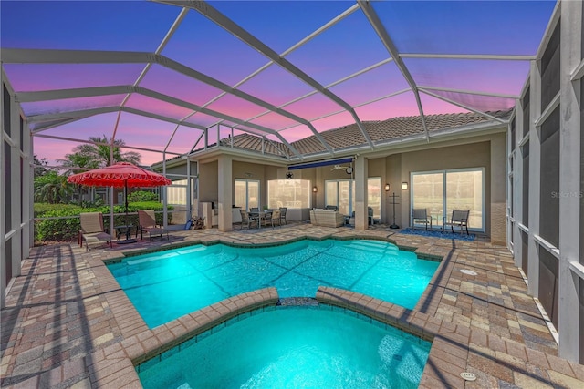 5205 88th St E, Bradenton, FL 34211 - view of pool with a patio area, a pool with connected hot tub, and outdoor dining area