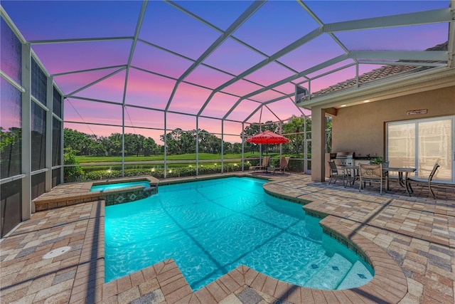 5205 88th St E, Bradenton, FL 34211 - view of pool with a patio area, a pool with connected hot tub, outdoor dining area, and a lanai