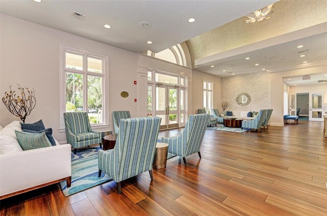 5205 88th St E, Bradenton, FL 34211 - living room with wood finished floors, healthy amount of natural light, and recessed lighting