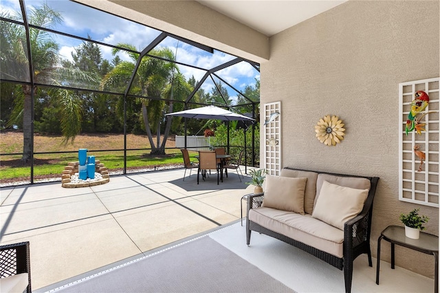 11794 Forest Park Cir, Bradenton, FL 34211 - view of patio / terrace with outdoor dining area, glass enclosure, and an outdoor hangout area