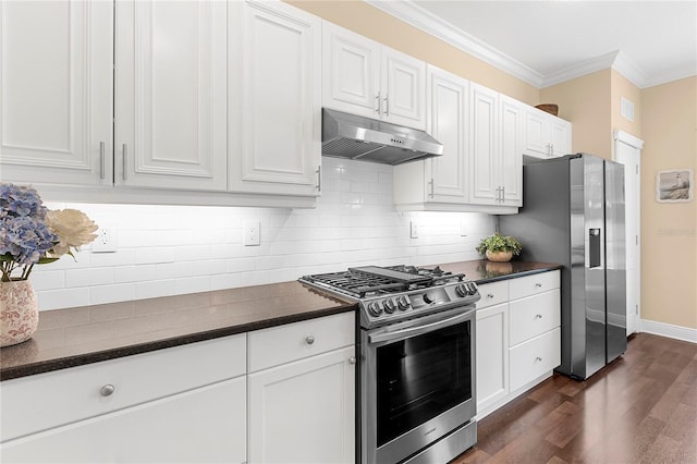 11794 Forest Park Cir, Bradenton, FL 34211 - kitchen featuring stainless steel appliances, under cabinet range hood, dark countertops, white cabinets, and dark wood-type flooring