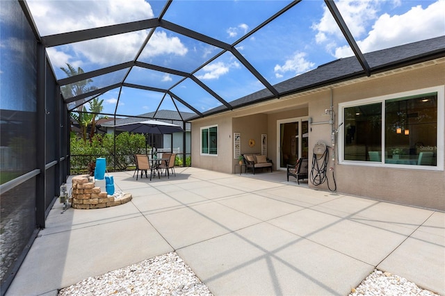 11794 Forest Park Cir, Bradenton, FL 34211 - view of patio / terrace with glass enclosure and outdoor dining space