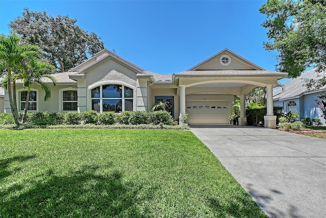 4603 4th Ave E, Bradenton, FL 34208 - ranch-style house featuring stucco siding, a front yard, a garage, and driveway