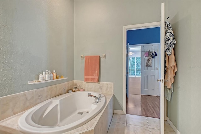 4603 4th Ave E, Bradenton, FL 34208 - full bathroom featuring a bath, tile patterned floors, and baseboards