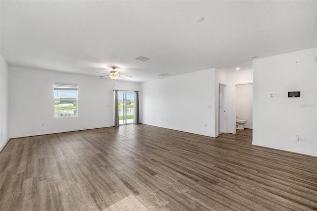 8656 40th Cir E, Palmetto, FL 34221 - unfurnished room with ceiling fan and wood finished floors