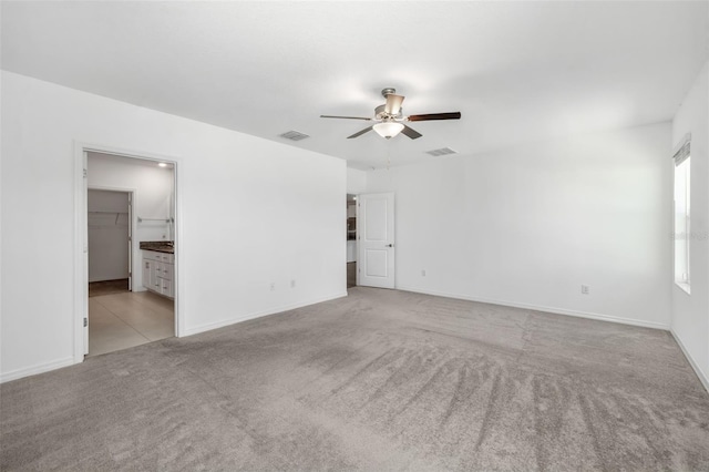 8656 40th Cir E, Palmetto, FL 34221 - carpeted spare room with a ceiling fan and baseboards