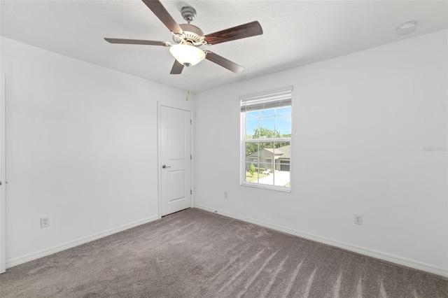 8656 40th Cir E, Palmetto, FL 34221 - carpeted spare room featuring a smoke detector, a ceiling fan, and baseboards
