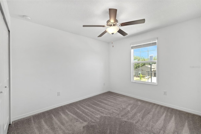 8656 40th Cir E, Palmetto, FL 34221 - carpeted empty room featuring baseboards and a ceiling fan