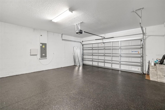 8656 40th Cir E, Palmetto, FL 34221 - garage featuring electric panel, a garage door opener, and concrete block wall