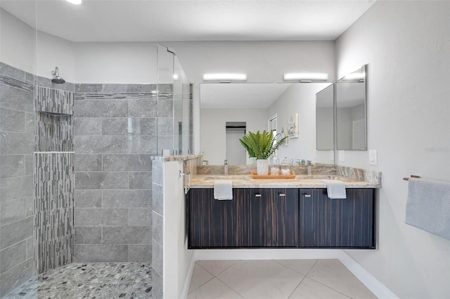 5125 Palm Aire Dr, Sarasota, FL 34243 - full bath featuring double vanity, walk in shower, and baseboards