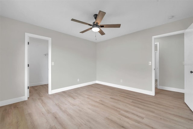 5125 Palm Aire Dr, Sarasota, FL 34243 - unfurnished room featuring ceiling fan, light wood finished floors, and baseboards