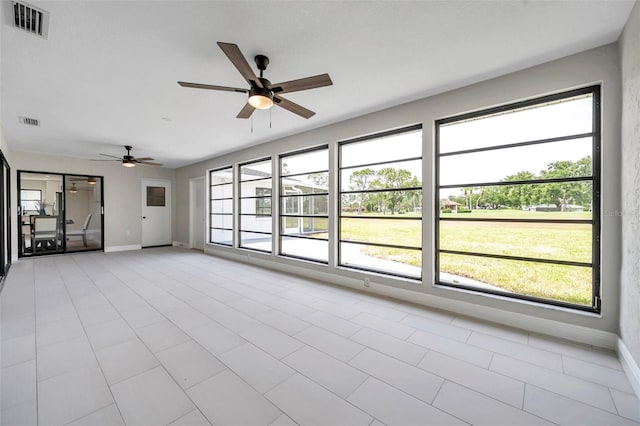 5125 Palm Aire Dr, Sarasota, FL 34243 - unfurnished room with a ceiling fan and baseboards