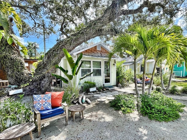 4412 125th St W, Cortez, FL 34215 - rear view of house featuring a patio