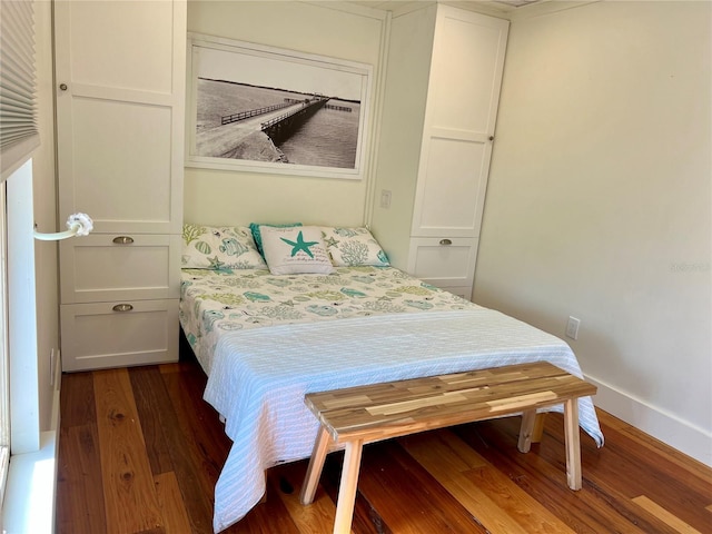 4412 125th St W, Cortez, FL 34215 - bedroom with dark wood-style flooring and baseboards