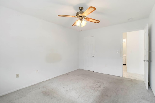 5062 White Oak Ct, Bradenton, FL 34207 - unfurnished bedroom with light carpet and ceiling fan