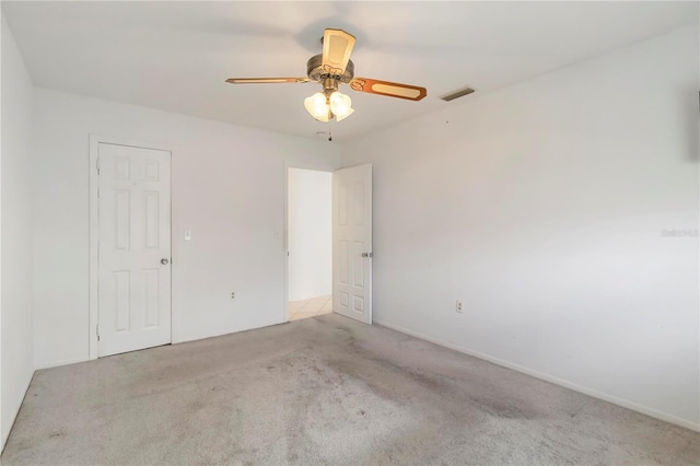 5062 White Oak Ct, Bradenton, FL 34207 - carpeted spare room with a ceiling fan