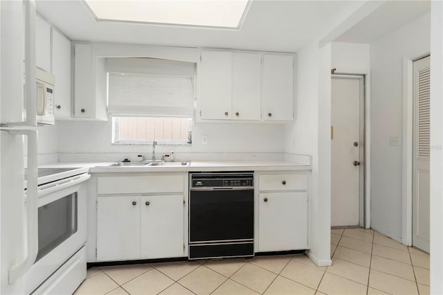 5062 White Oak Ct, Bradenton, FL 34207 - kitchen with white appliances, a sink, light countertops, white cabinetry, and light tile patterned floors