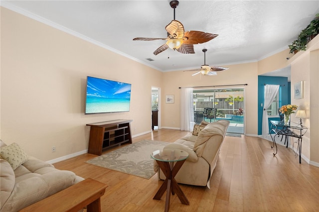 4222 Lanai Dr, Sarasota, FL 34241 - living area with ceiling fan, light wood-type flooring, baseboards, and ornamental molding