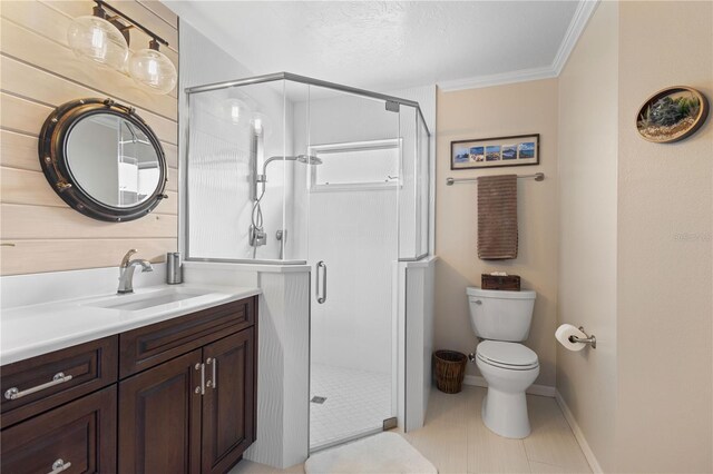 4222 Lanai Dr, Sarasota, FL 34241 - bathroom with vanity, toilet, a shower stall, baseboards, and crown molding