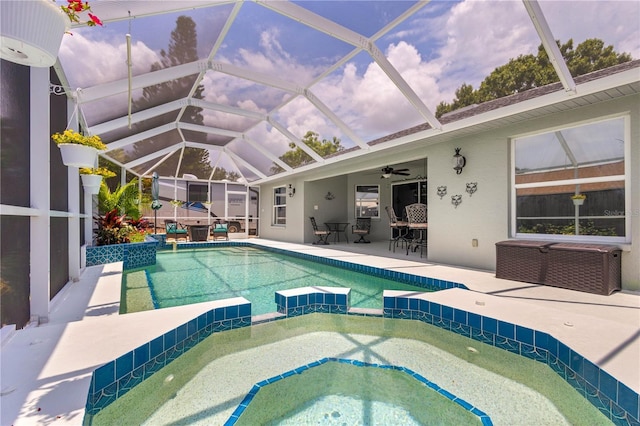 4222 Lanai Dr, Sarasota, FL 34241 - view of swimming pool featuring a pool with connected hot tub, a patio area, a lanai, and ceiling fan