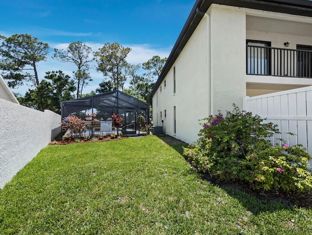 6110 Country Club Way Unit 102, Sarasota, FL 34243 - view of yard featuring a lanai and central AC unit