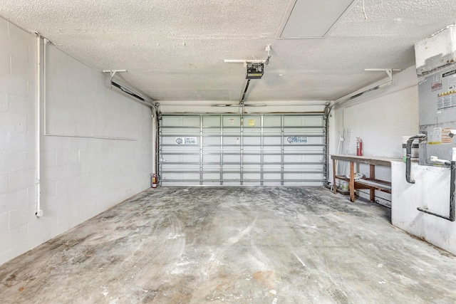 2420 16th St W, Palmetto, FL 34221 - garage with a garage door opener and concrete block wall
