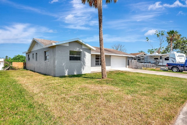 2420 16th St W, Palmetto, FL 34221 - view of front of property featuring stucco siding, driveway, a garage, and roof with shingles