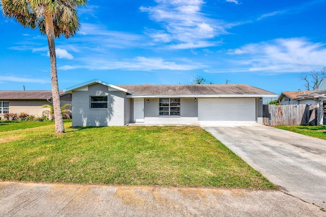 2420 16th St W, Palmetto, FL 34221 - ranch-style home with stucco siding, a garage, and driveway