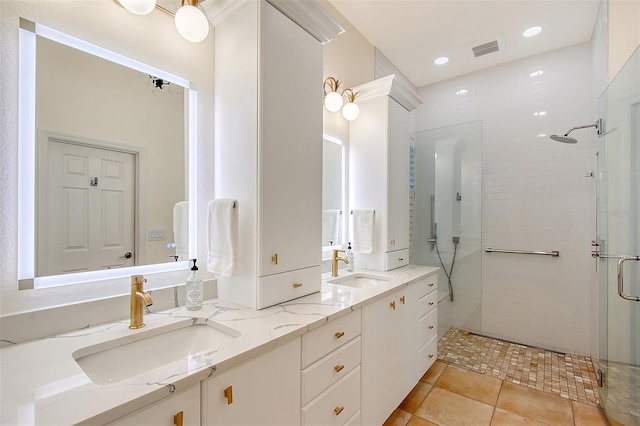 4108 Roberts Point Rd, Sarasota, FL 34242 - full bath featuring a stall shower, double vanity, tile patterned flooring, and recessed lighting