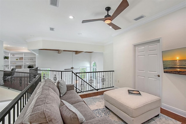 4108 Roberts Point Rd, Sarasota, FL 34242 - living area with a ceiling fan, wood finished floors, ornamental molding, recessed lighting, and baseboards